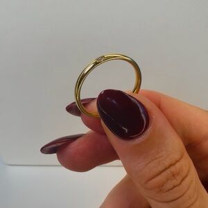 Elegant Gold Ring with Diamond Accent